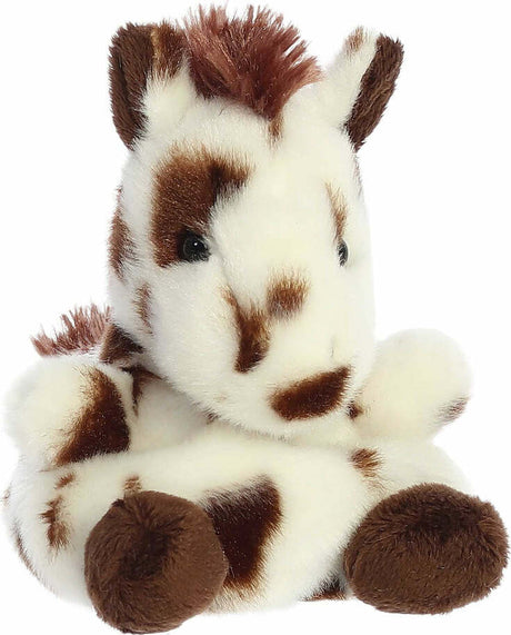 Plush toy horse with brown spots on a white background