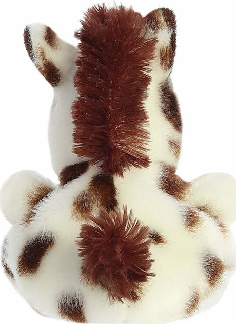 Plush horse toy with brown spots on a white background