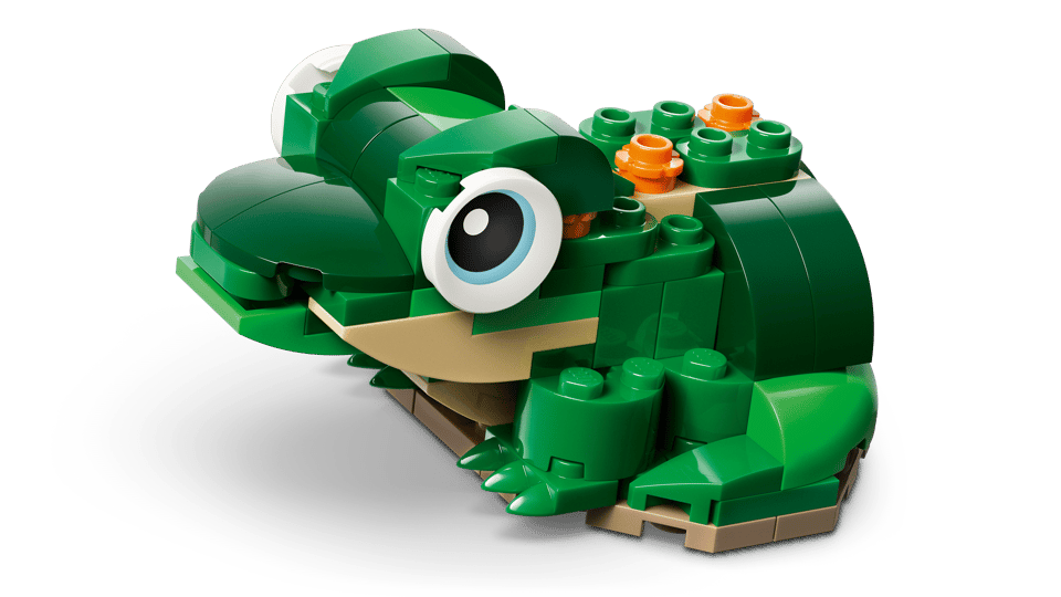  LEGO Creator: Turtle with a Water Lily Flower Green toy frog made of interlocking bricks on a gray background