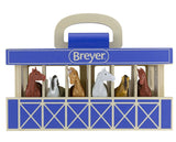 Breyer model horse set in a blue and beige carrying case on a white background
