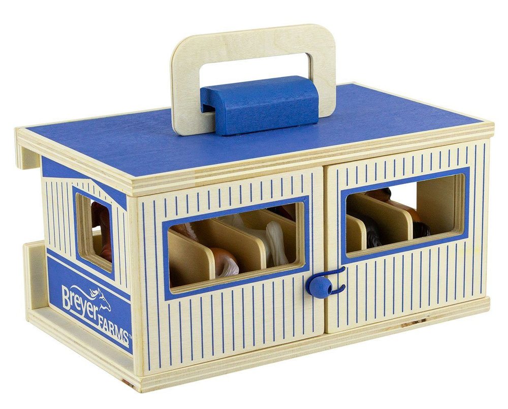 Wooden toy stable with blue accents and Breyer Farms branding on a white background