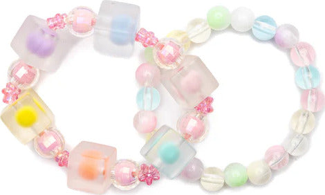 Colorful beaded Hip to Be Square Bracelets with pastel shades on a white background