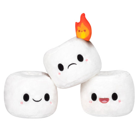 Three soft Mini Comfort Food Marshmallows plush toys with cute faces, one featuring a small flame on top, displayed on a white background.