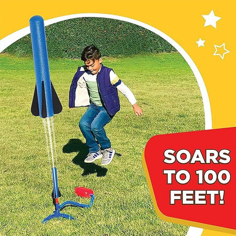 Child playing with a Stomp Rocket® Jr. Rockets with 8 rockets toy that soars to 100 feet on a grassy field