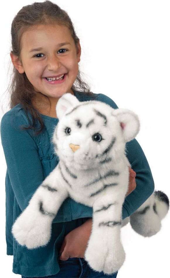 Girl holding a plush Zahara DLux White Tiger on a white background