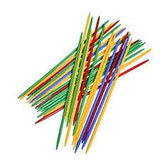Colorful Giant Pick Up Sticks scattered on a white background