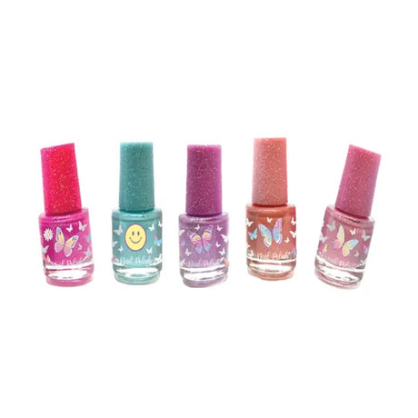 Set of five small nail polish bottles with colorful designs on a white background