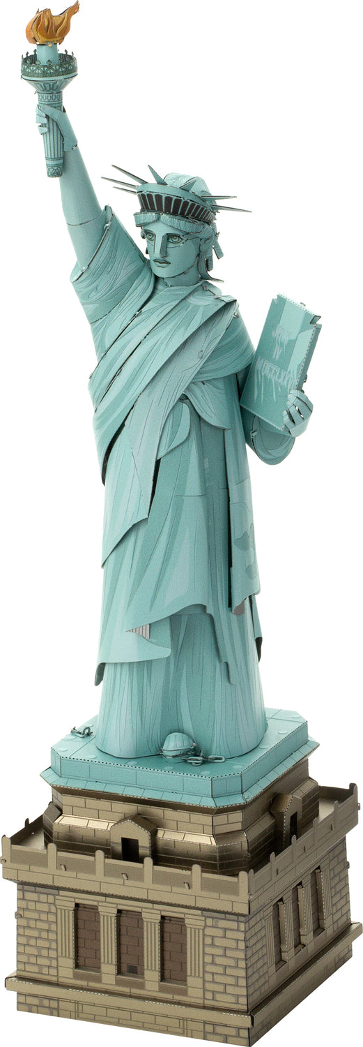 Metal model of the Statue of Liberty on a white background