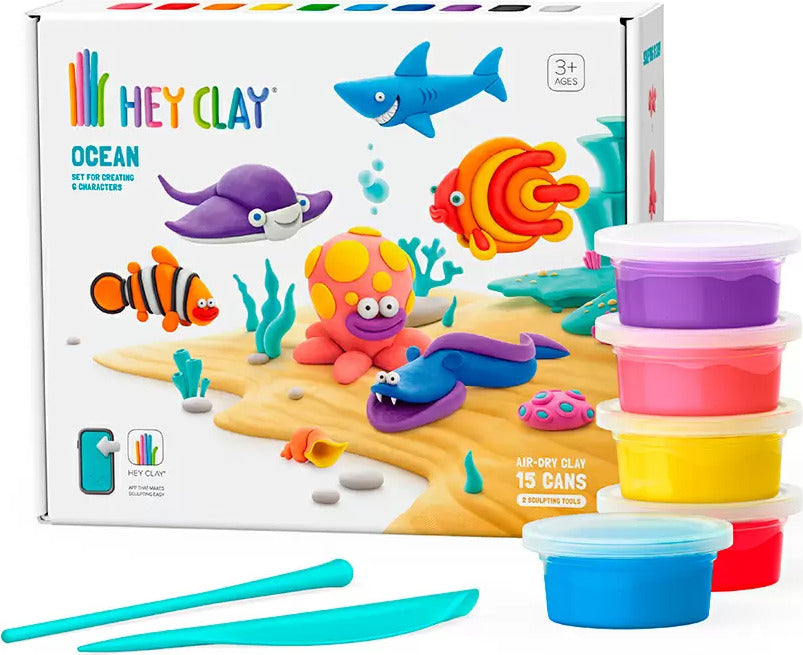 Hey Clay ocean-themed play set with colorful containers and tools on a white background