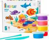 Hey Clay ocean-themed play set with colorful containers and tools on a white background