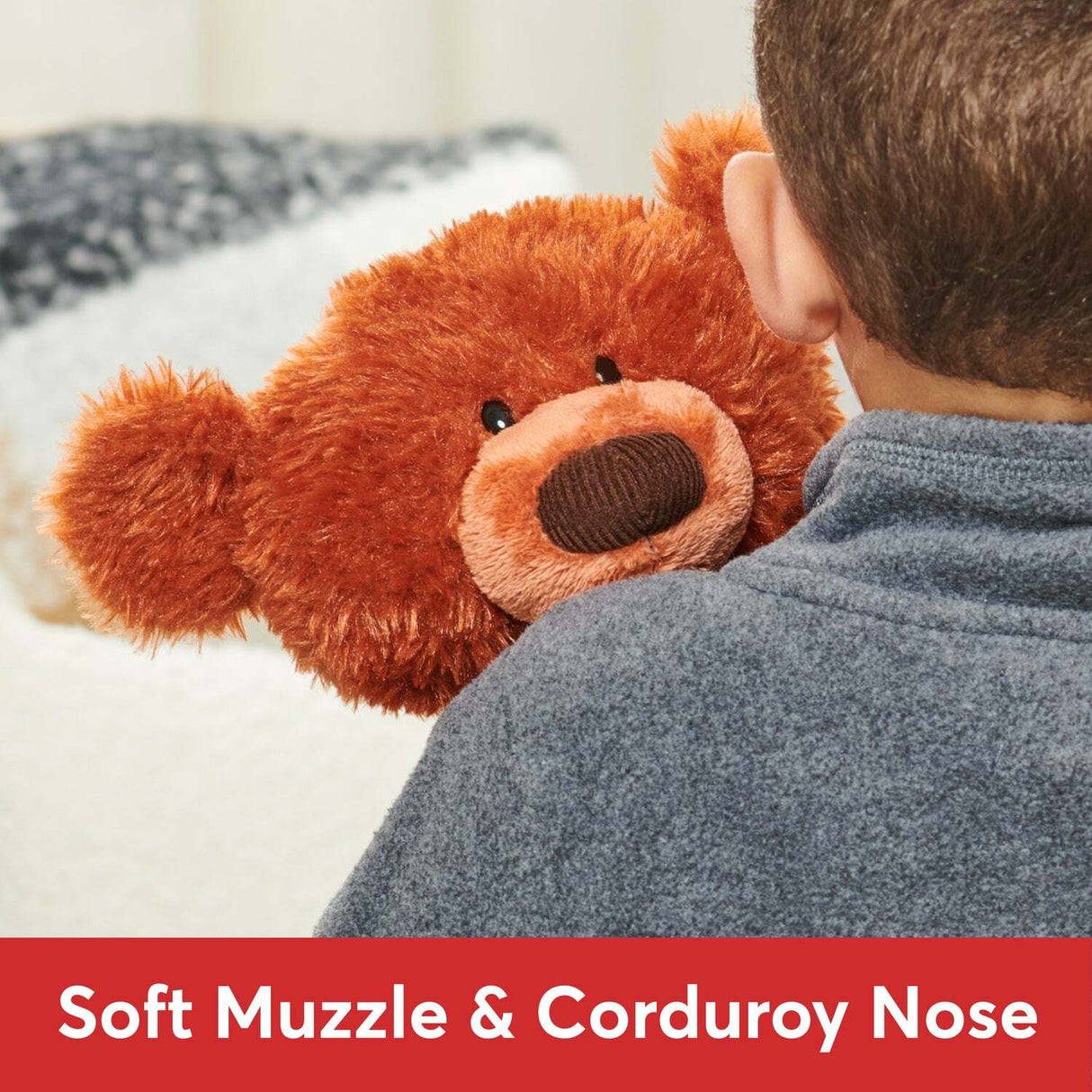Child holding a Pumpkin Pie Toothpick Bear, 15 In with a soft muzzle and corduroy nose, on a light background.