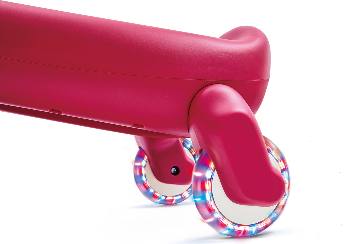 Close-up of a Wiggle & Giggle Car, Red with colorful wheels on a white background