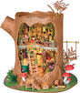 Fairytale Tree House DIY Miniature House with a forest theme, including trees, plants, and furniture.