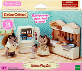 Calico Critters kitchen play set packaging with two critters and a refrigerator.