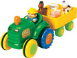 Fun Time Tractor with a farmer figure and animals in a trailer on a white background