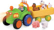 Toy Funtime Tractor with a trailer carrying farm animals on a white background