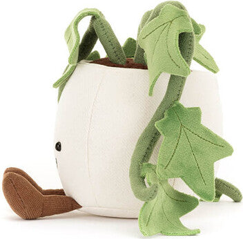 Side view of a plush toy Amuseables Ivy plant with green leaves and a white base on a white background