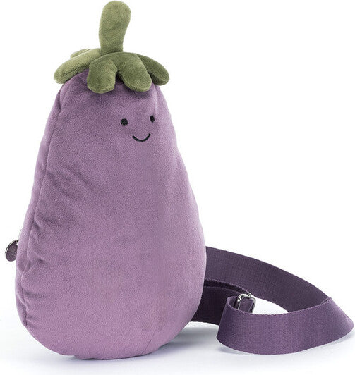 A purple Amuseables Aubergine Bum Bag with a green plush top and a smiling embroidered face, shown on a clean white background with the strap extended.
