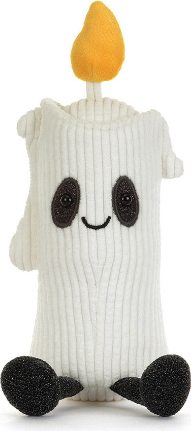 A white ribbed plush Amuseables Flickerty Candle character toy with a yellow flame on top, black embroidered eyes and smile, and black feet, shown on a plain white background.