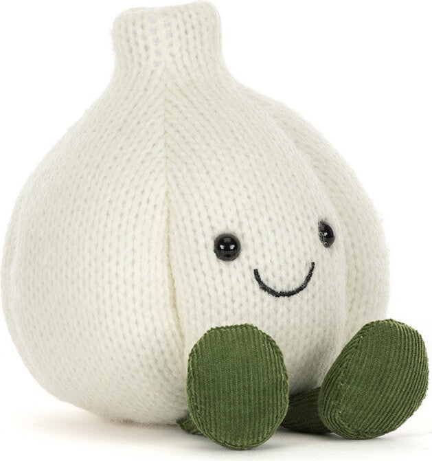 A Amuseables Garlic plush toy in off-white with olive green feet and a simple embroidered smiley face, photographed on a clean white background.