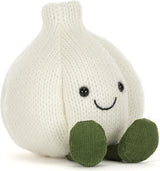 A Amuseables Garlic plush toy in off-white with olive green feet and a simple embroidered smiley face, photographed on a clean white background.