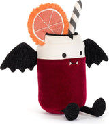 A plush Amuseables Vampop Drink toy on a white background. The character features a deep red body, a white head, black bat wings, a black-and-white striped straw, and a glittery orange grapefruit garnish.
