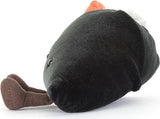 A plush Amuseables Comeroi Temaki toy featuring a black textured body, and brown feet photographed on a white background.