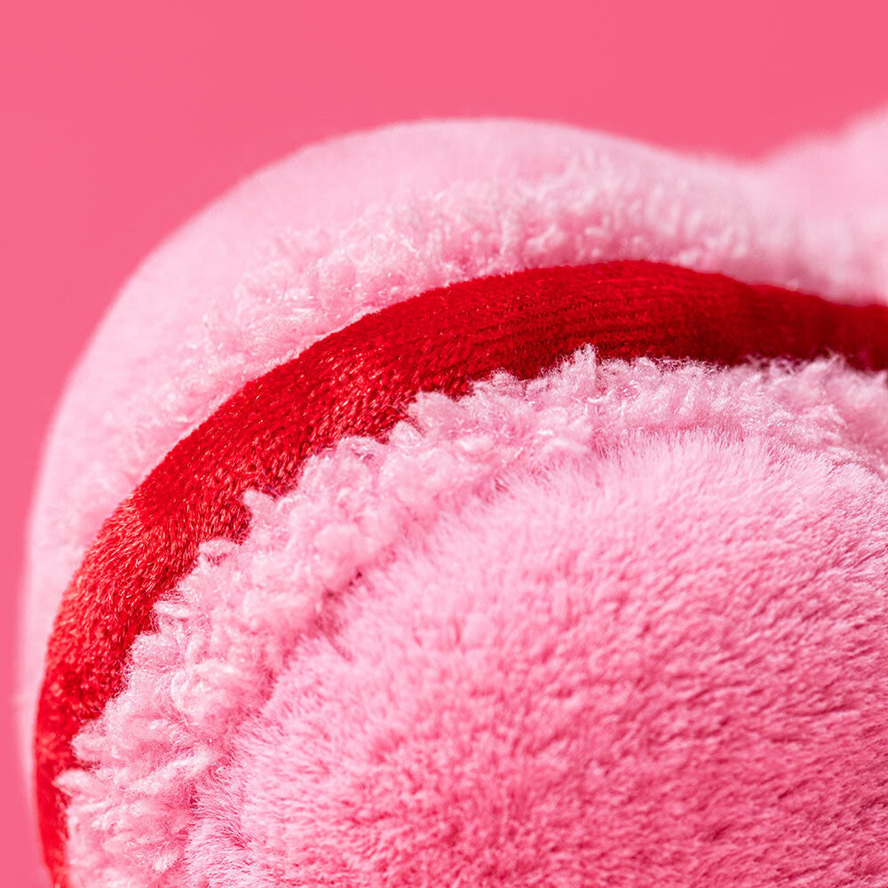 Close-up of pink and red Amuseables Colette Pink Heart Macaron on a pink background