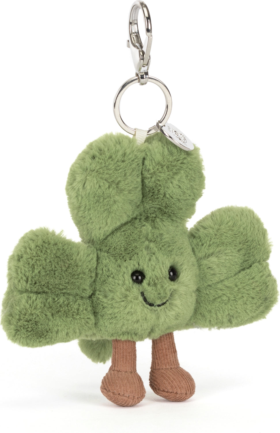 Amuseables Siofra Shamrock Bag Charm featuring a soft green plush shamrock with a smiling face and brown fabric legs, attached to a silver keyring and clip.