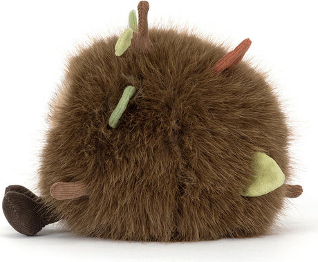 A brown fuzzy Amuseables Mulshi Woodland Floor plush toy with small leaf and stem accents in green, brown, and orange, photographed on a clean white background.