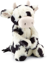 Plush stuffed animal of a black and white calf with soft fur and embroidered details, designed as a cuddly Bashful Calf for children’s play and comfort.