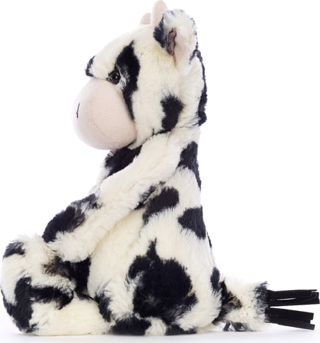 Soft plush toy of Bashful Calf with black and white spots, sitting in profile with a gentle expression, perfect for toddlers and kids.