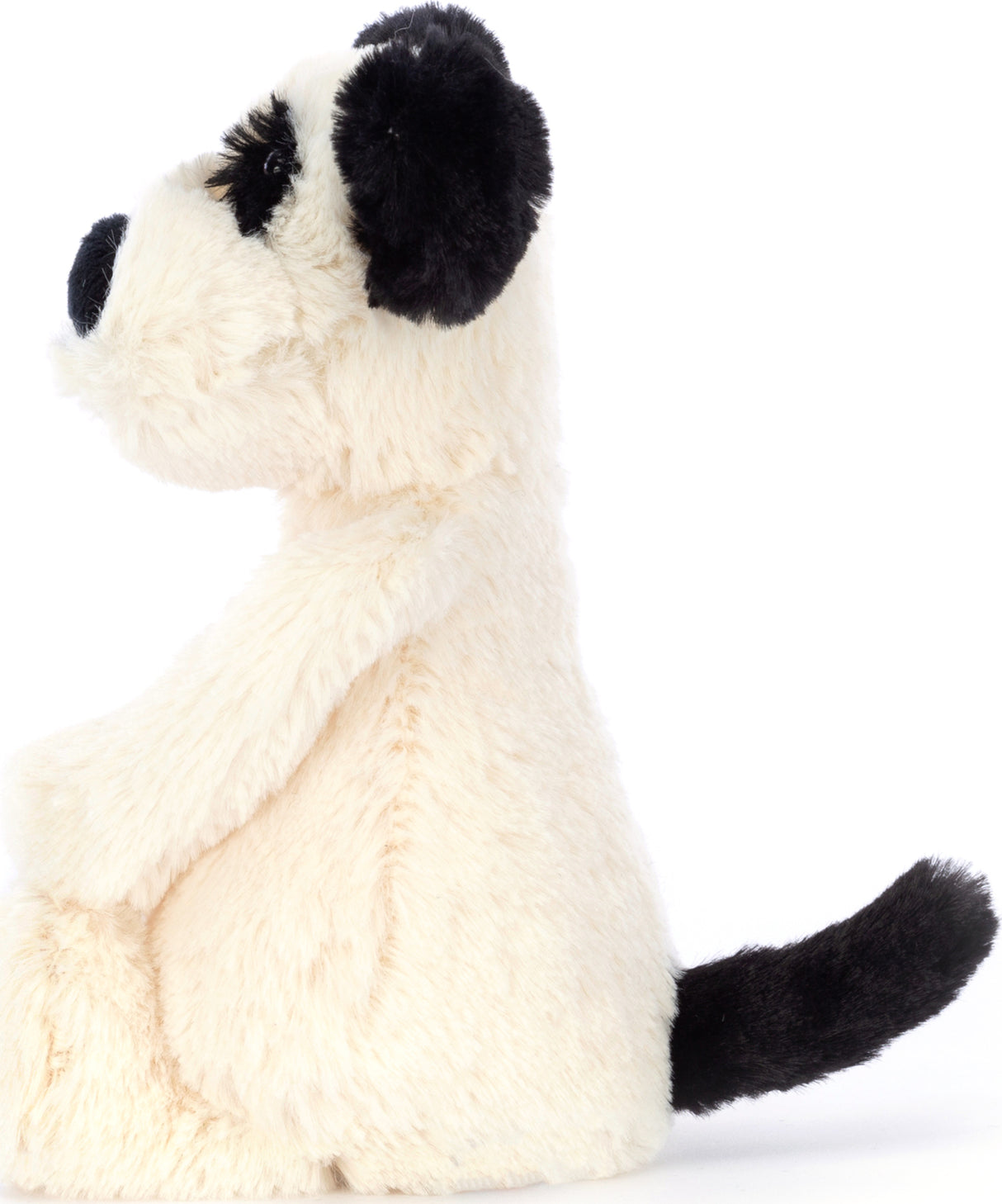 Bashful Black & Cream Puppy Small plush toy seated in profile, featuring soft cream fur with black ears, tail, and nose, perfect as a cuddly companion or kids birthday gift.
