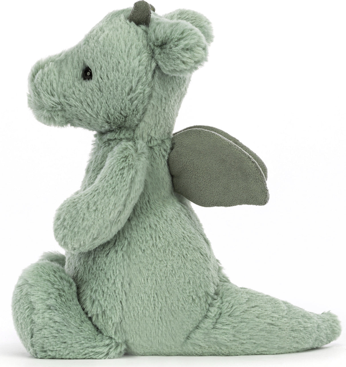 Soft green plush toy in the shape of a small dragon with wings and black eyes, designed as the Bashful Dragon Small, perfect for cuddling and imaginative play.