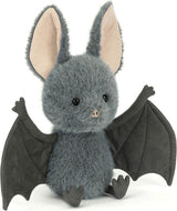 Plush toy Broox Bat with gray fur and black wings on a white background