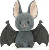 Plush toy Broox Bat with gray fur and black wings on a white background