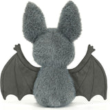 Plush toy Broox Bat with gray fur and black wings on a white background