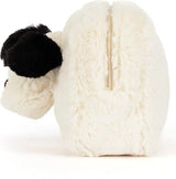 A plush Rufferty Puppy Pouch in cream faux fur with a black ear and black eye detail, shown on a white background.