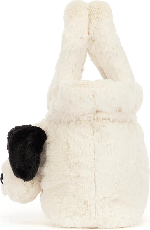 A plush Rufferty Puppy Handbag in off-white faux fur with a black ear patch, photographed on a clean white background.