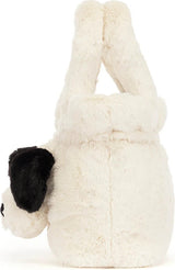 A plush Rufferty Puppy Handbag in off-white faux fur with a black ear patch, photographed on a clean white background.