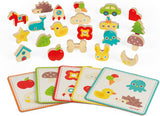 Set of wooden toys with cards featuring animal and object illustrations from the Memory Touch Recognition Game on a white background