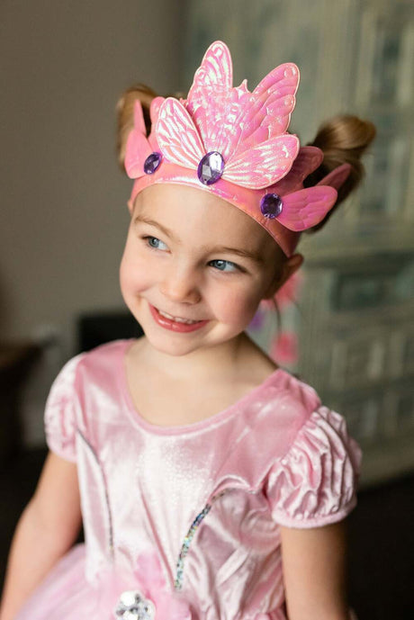 Young girl wearing a Pink Butterfly Soft Crown - Ages 3+, smiling.