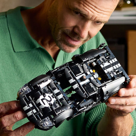 Man holding a LEGO Technic: 1966 Ford GT40 MKII Race Car