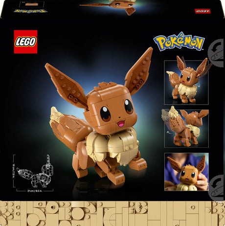 LEGO Pokémon Eevee building set box front, showing a assembled brown and cream Eevee figure on a black background with LEGO and Pokémon branding, smaller product views, a line drawing, and a photo inset of a hand holding the toy.