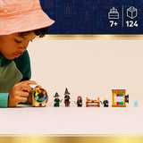 Child playing with a LEGO Harry Potter: Hogwarts™ Castle: Sorting Hat™  Ceremony set