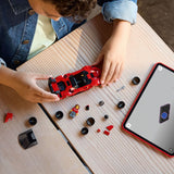 Child building a LEGO Speed Champions: Ferrari SF90 XX Stradale Sports Car set