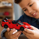 Child holding a LEGO Speed Champions: Ferrari SF90 XX Stradale Sports Car