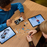 Children budling a LEGO Speed Champions: Time Machine from Back to the Future set