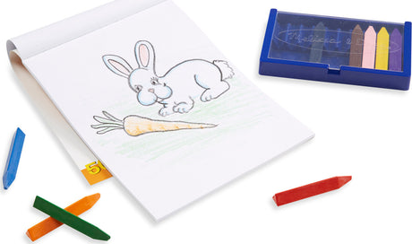Drawing Paper Pad with drawing of bunny and carrot along with crayons on white background.