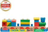 Stacking train toy with colorful wooden blocks and a 'Good Toy' accreditation badge on a white background.